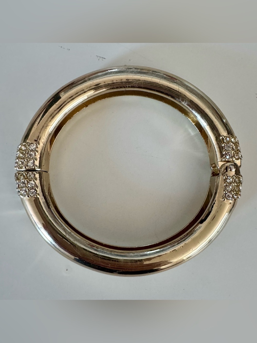NWOT Large Gold Toned Hinged Bangle with Crystals